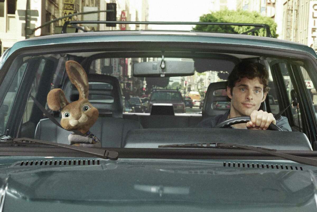 E.B. (Russell Brand), the heir to the Easter bunny title, goes for a drive with his new friend “James Marsden) in “Hop.”