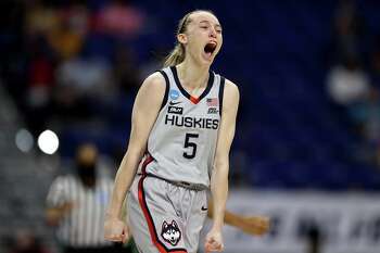 SAN ANTONIO, TEXAS - MARCH 29: Paige Bueckers #5 of the UConn Huskies celebrates her three point basket in the first quarter against the Baylor Lady Bears during the Elite Eight round of the NCAA Women's Basketball Tournament at the Alamodome on March 29, 2021 in San Antonio, Texas. (Photo by Elsa/Getty Images) ***BESTPIX***