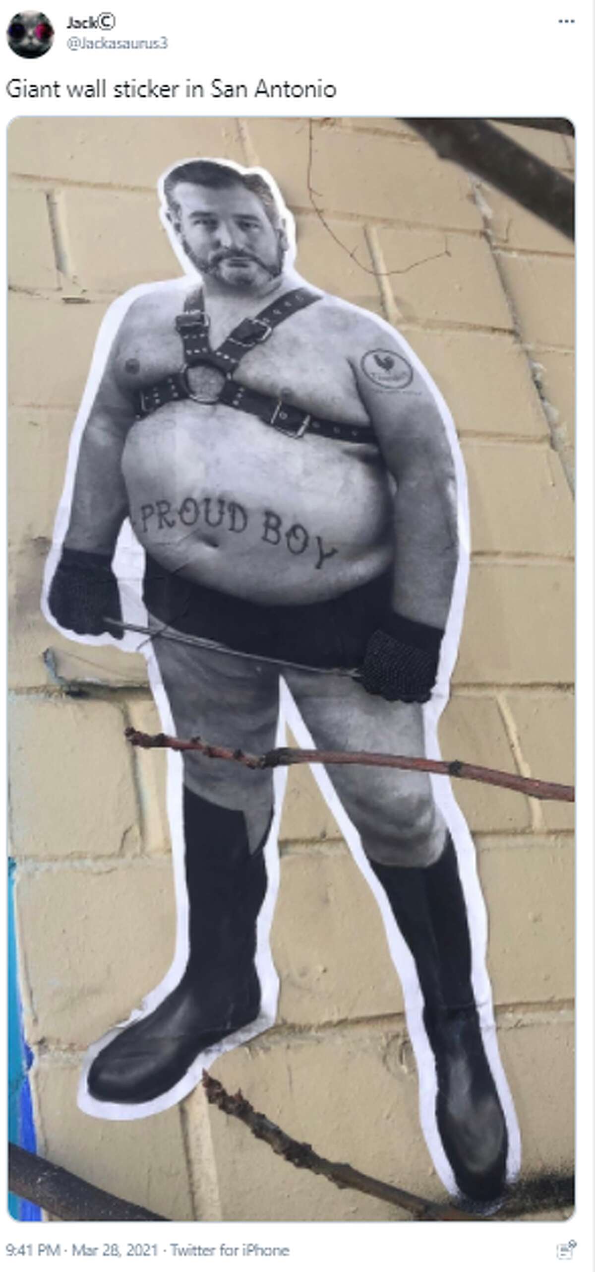 Giant stickers depicting a shirtless U.S. Sen. Ted Cruz wearing a leather harness and a "Proud Boy" tattoo have popped on the sides of San Antonio buildings.