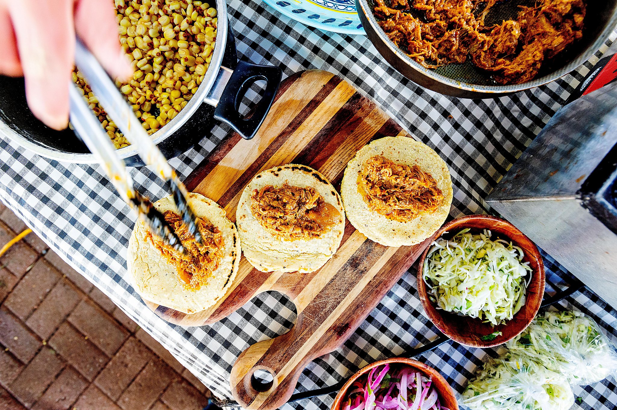 In a Bay Area underground oven, chefs are making smoky, earthy pork