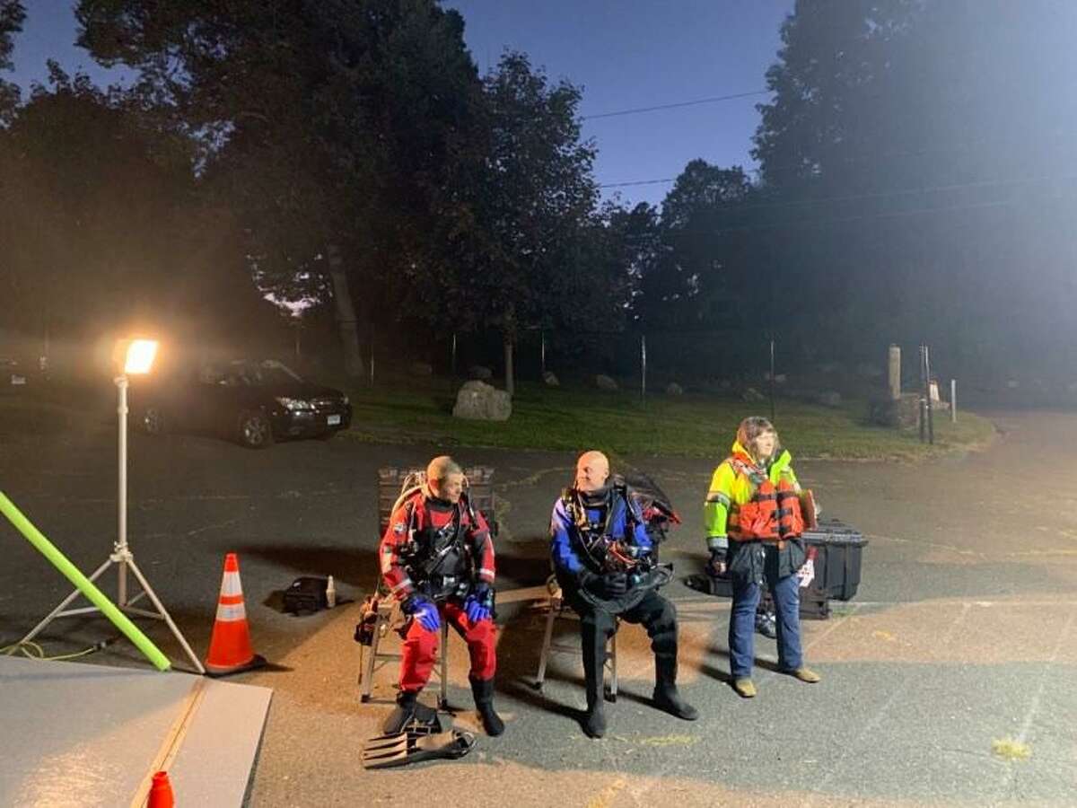 Region Five Dive Team divers, from left, Mark Abbenante, Peter Bergamo; tender, Marcia Makenzie
