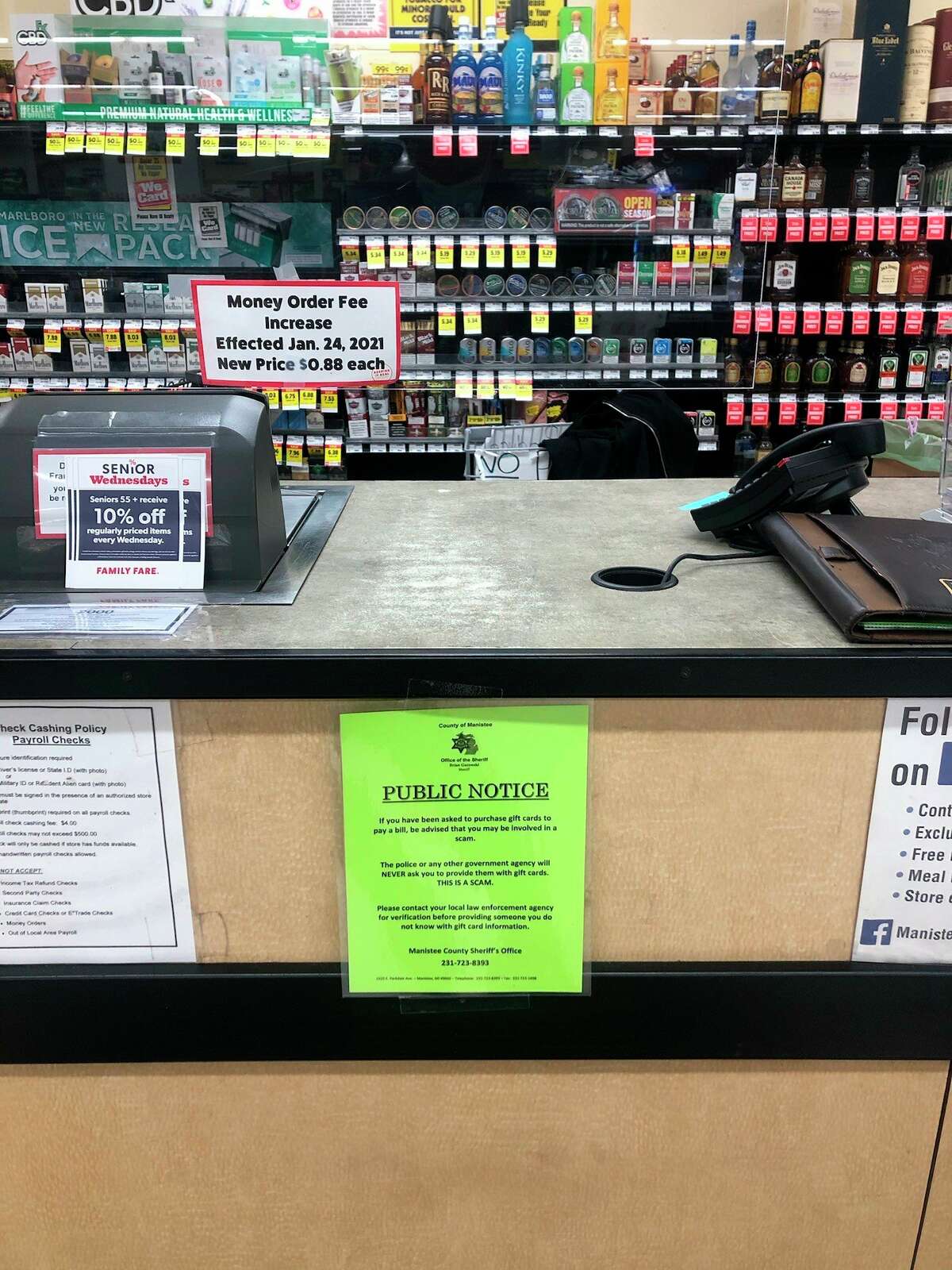 Public notices from the Manistee County Sheriff's Office have started being placed at some businesses in the county that sell gift cards in an effort to warn people and prevent them falling victim to scams. (Courtesy photo)