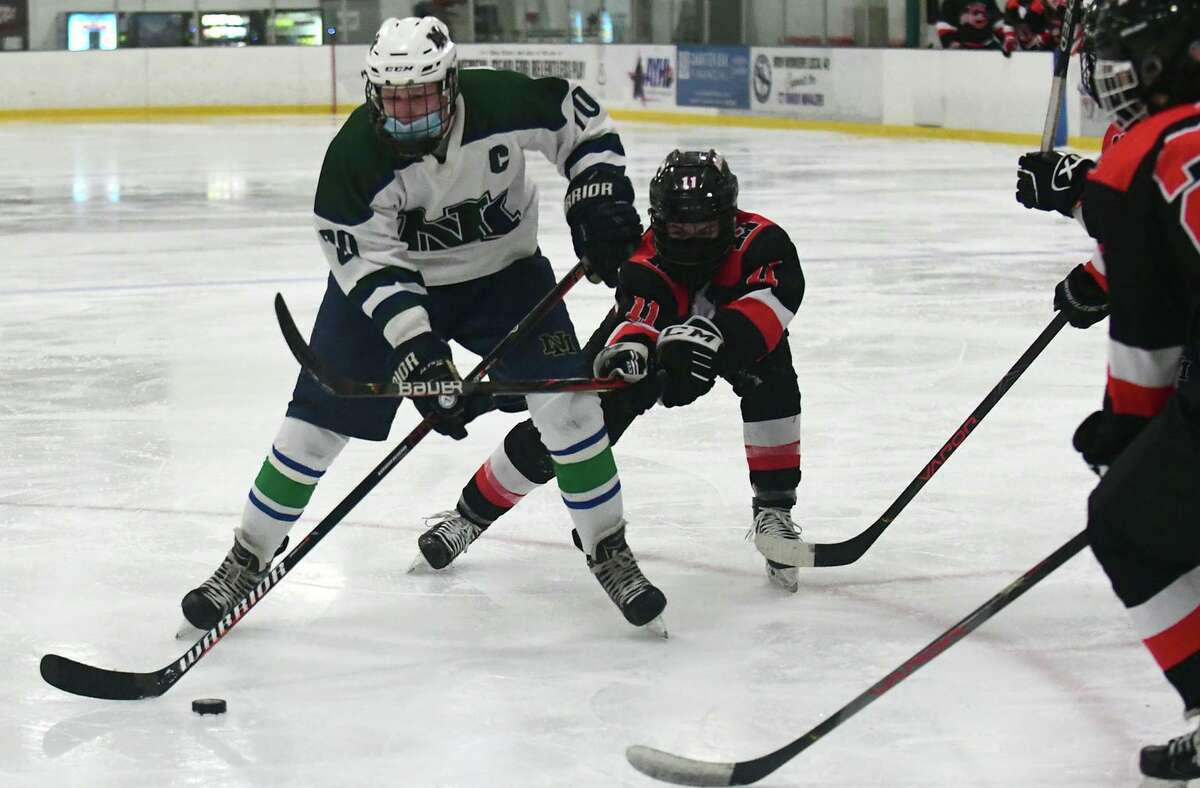 The Norwalk high school co op team takes on the Milford co op team in CIAC action Wednesday, February 24, 2021, at SoNo Ice House in Norwalk, Conn. Norwalk winter sports are livestreaming hockey matches at SoNo Ice House because spectators aren't allowed due to COVID. But the livestream system in the hockey rink is subscription only. The team is trying to get 1,000 subscribers on YouTube so they can livestream games for free.