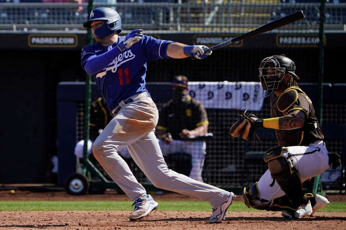 The Dodgers' AJ Pollock bats during a spring training game against the Padres earlier this month in Peoria, Ariz.