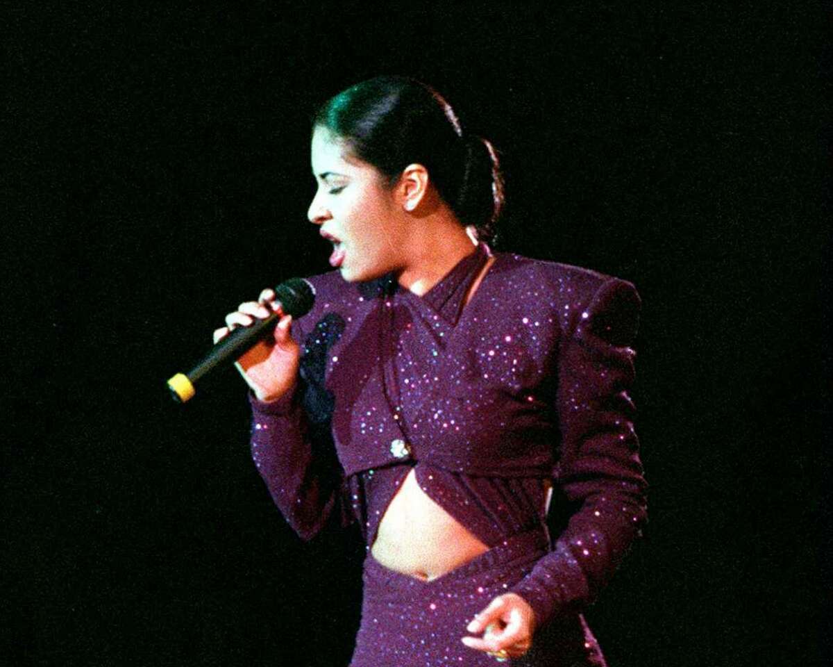 Tejano music star Selena performs at the Spurs Stay in School Jamboree in the Alamodome in San Antonio in this March 18, 1995, file photo.
