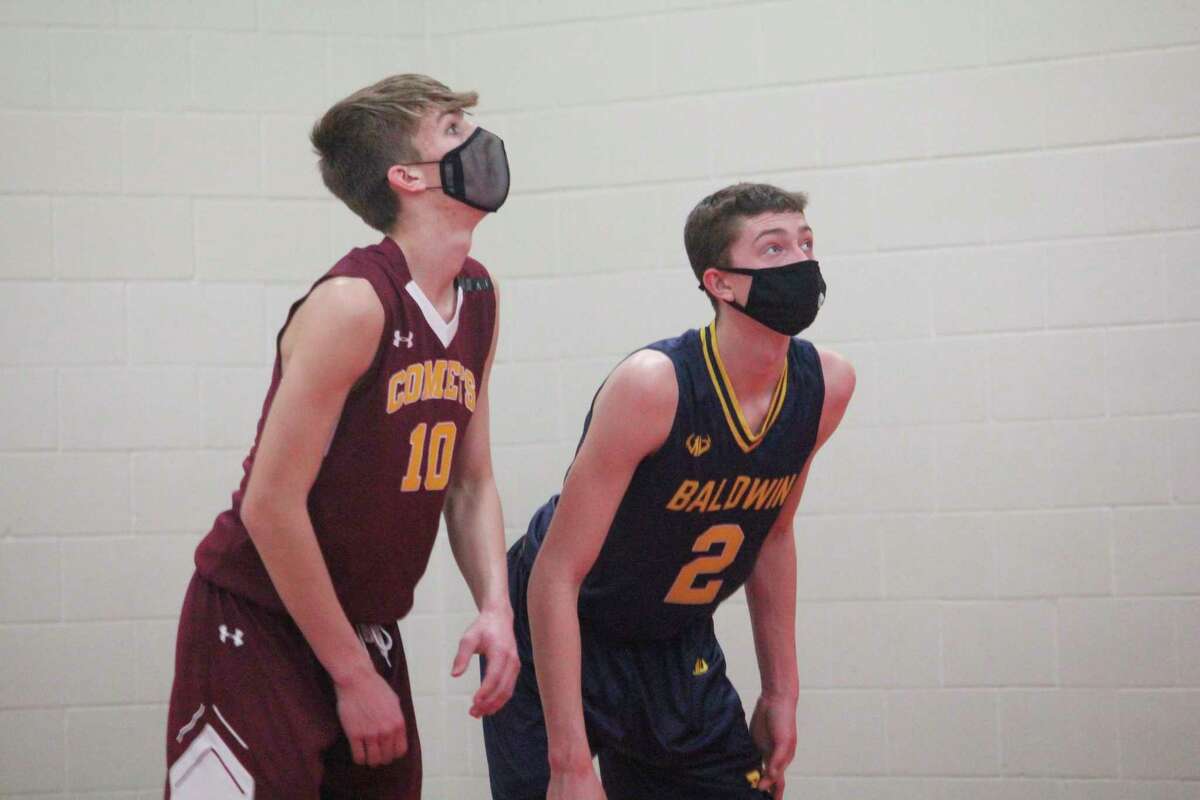 Baldwin's Dylan Hibma (2) gets ready for a possible rebound against McBain NMC. (Star photo/John Raffel)