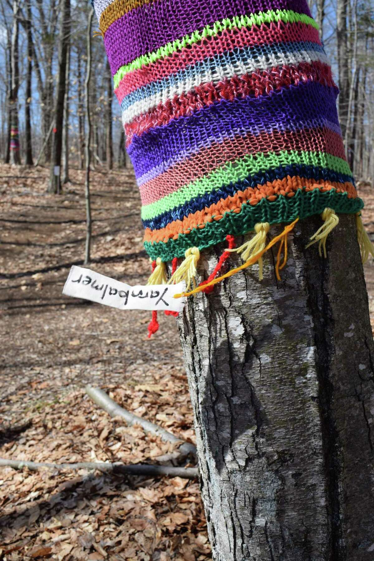 Beginning in April, hikers can expect a bit more decoration on the trees at the Woodcock Nature Center in Wilton. An artist known as