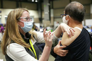 Washington ranks 17th for share of people vaccinated