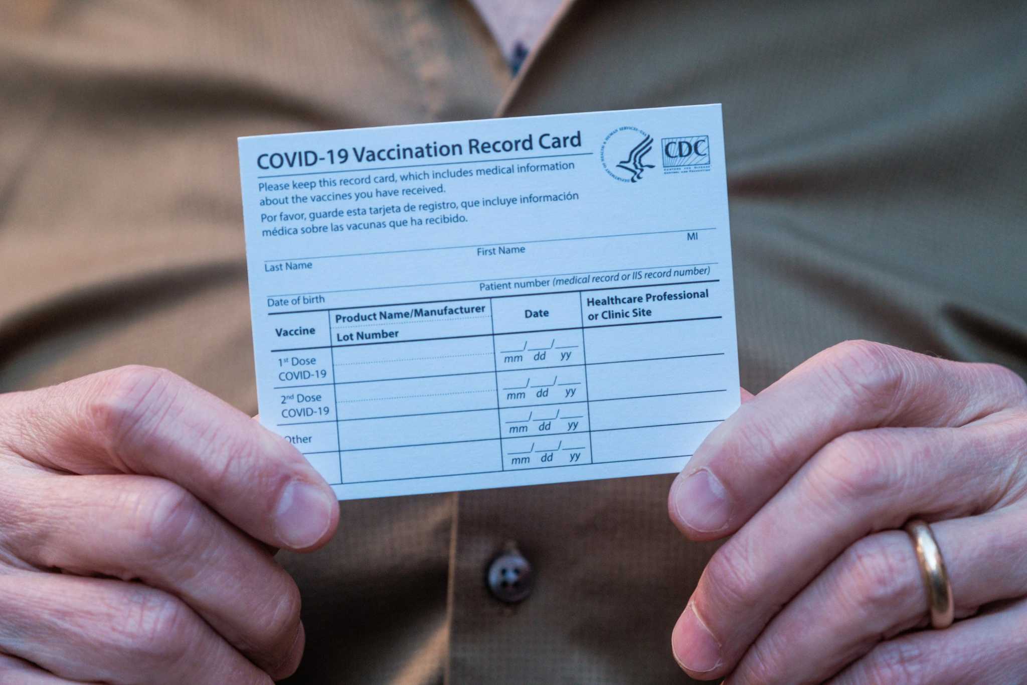 Online scammers traffic in fake COVID vaccination cards, authorities warn - Vimarsana News