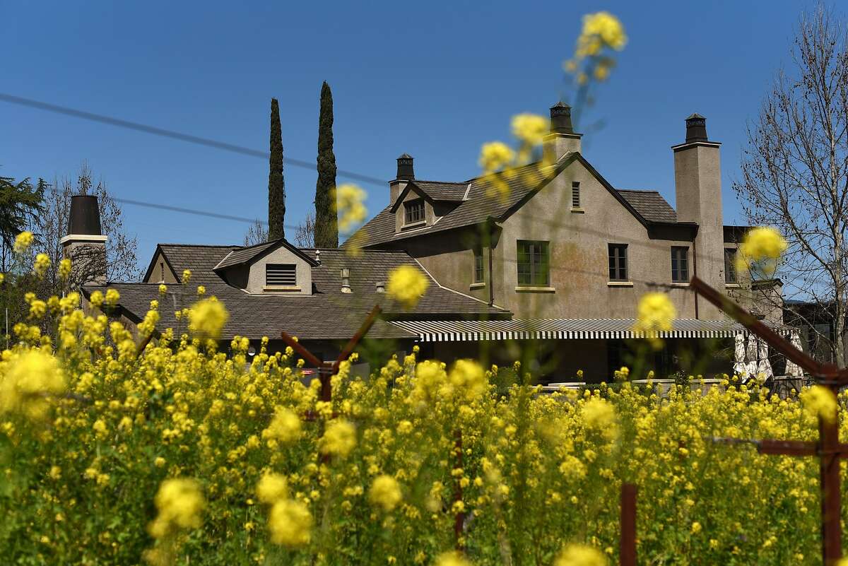 The Steckter House, a historic building where the Staglin family hosts wine tastings, adjacent to its vineyard.