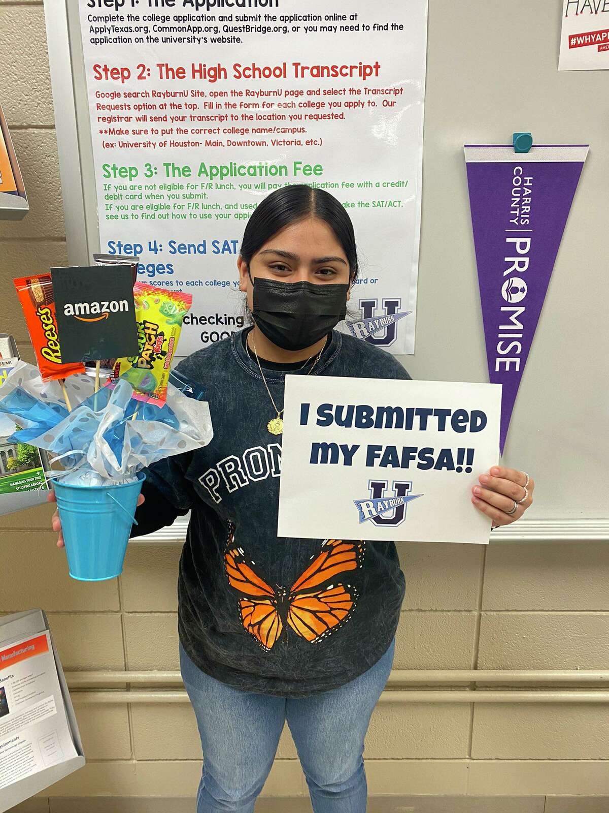 Sam Rayburn senior Diana Medina shows off her prize for submitting her college financial aid application before this year's Promise deadline.