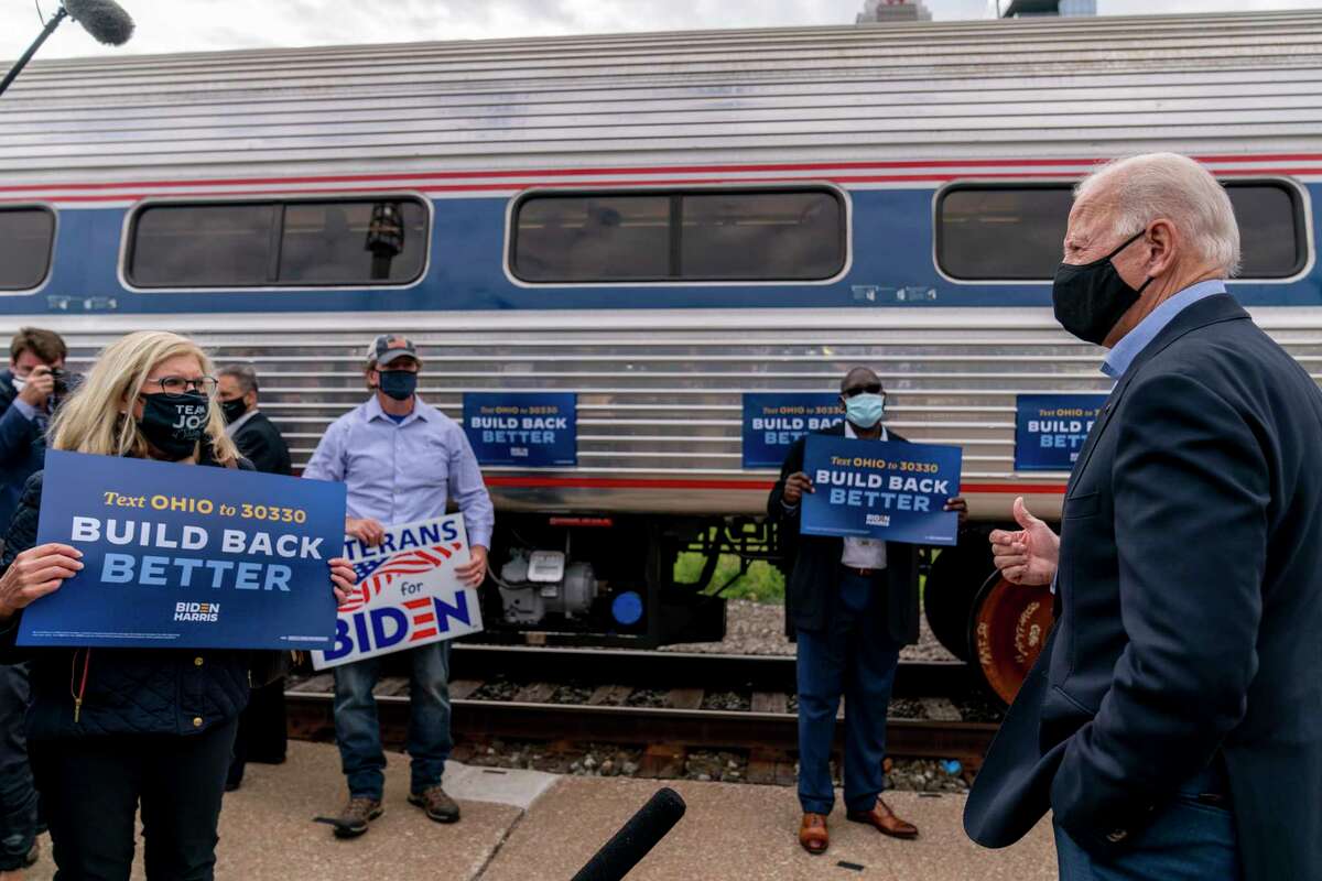 Then-Democratic presidential candidate and former Vice President Joe Biden spoke to supporters before boarding his train at Amtrak's Cleveland Lakefront train station, Wednesday, Sept. 30, 2020, in Cleveland, Biden was on a train tour through Ohio and Pennsylvania. (AP Photo/Andrew Harnik)
