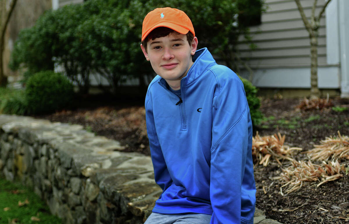 16-year-old, Luke Schwartz at his home Thursday, April 1, 2021, in Wilton, Conn. Schwartz has a rare type of thyroid cancer and a host of other health issues and had hoped that, due to his health issues, he'd get the COVID vaccine early. But, when Lamont went by an age classification, His mother took matters into her own hands and got Luke vaccinated in Vermont, where the family also owns a home.
