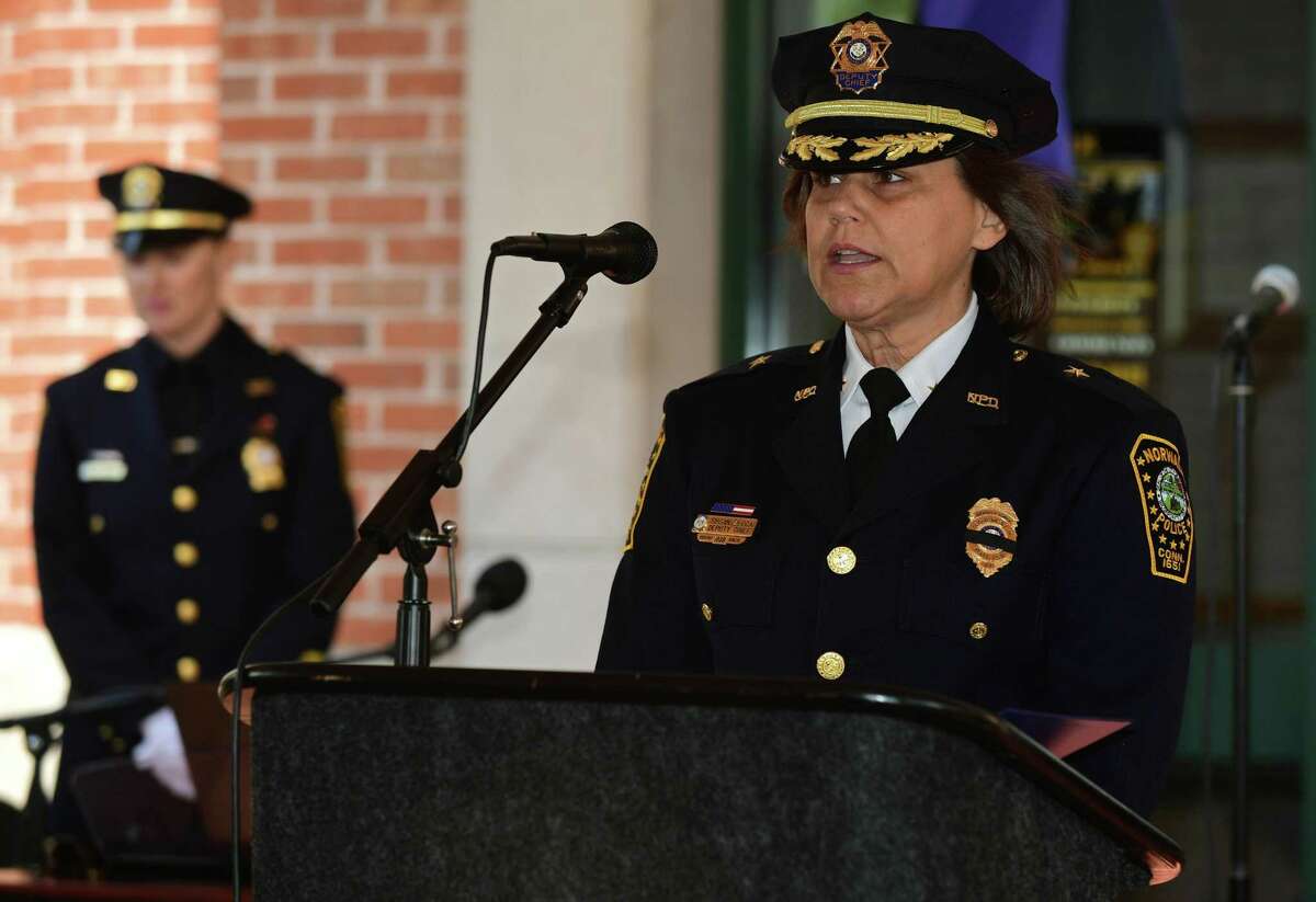Deputy Chief Susan Zecca, The Norwalk Police Department and their guests honor fallen officers Wednesday, May 15, 2019, during their annual Memorial Service at police headquarters in Norwalk, Conn.