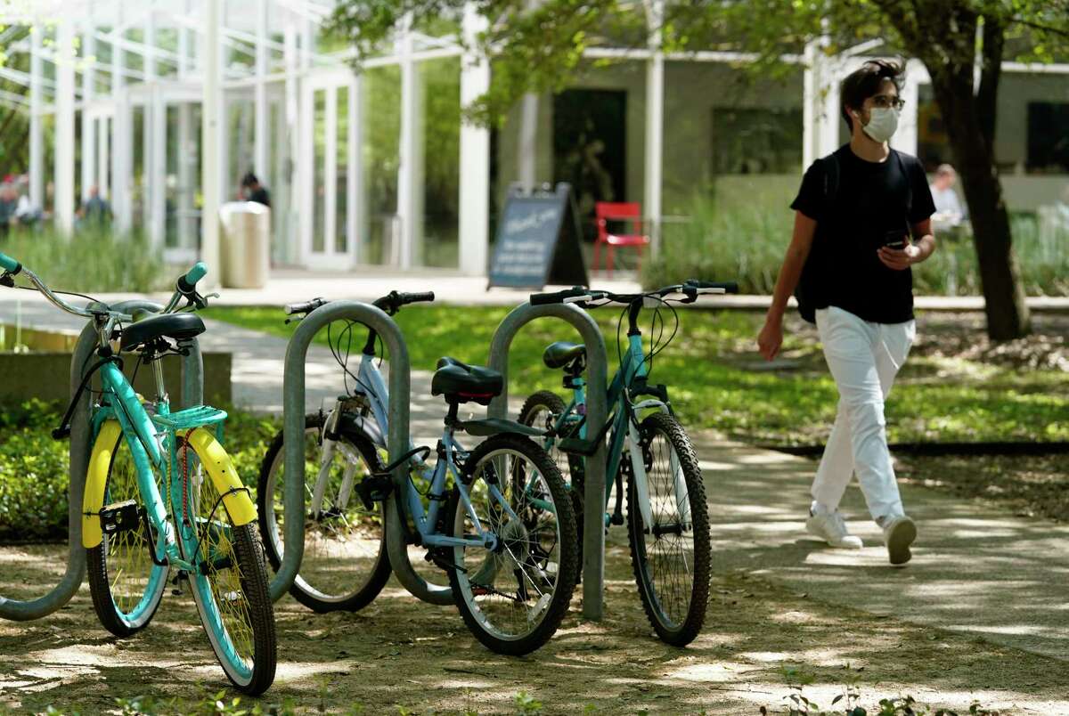 Bicycles are shown on the campus of Rice University near the Brochstein Pavilion Thursday, April 1, 2021 in Houston. Rice University has announced an expansion of its student body and its campus. The physical expansion on the college’s 300 acres, will include a 12th residential college, a new engineering building, a building for the visual and dramatic arts, and a new student center that will largely replace the Rice Memorial Center.