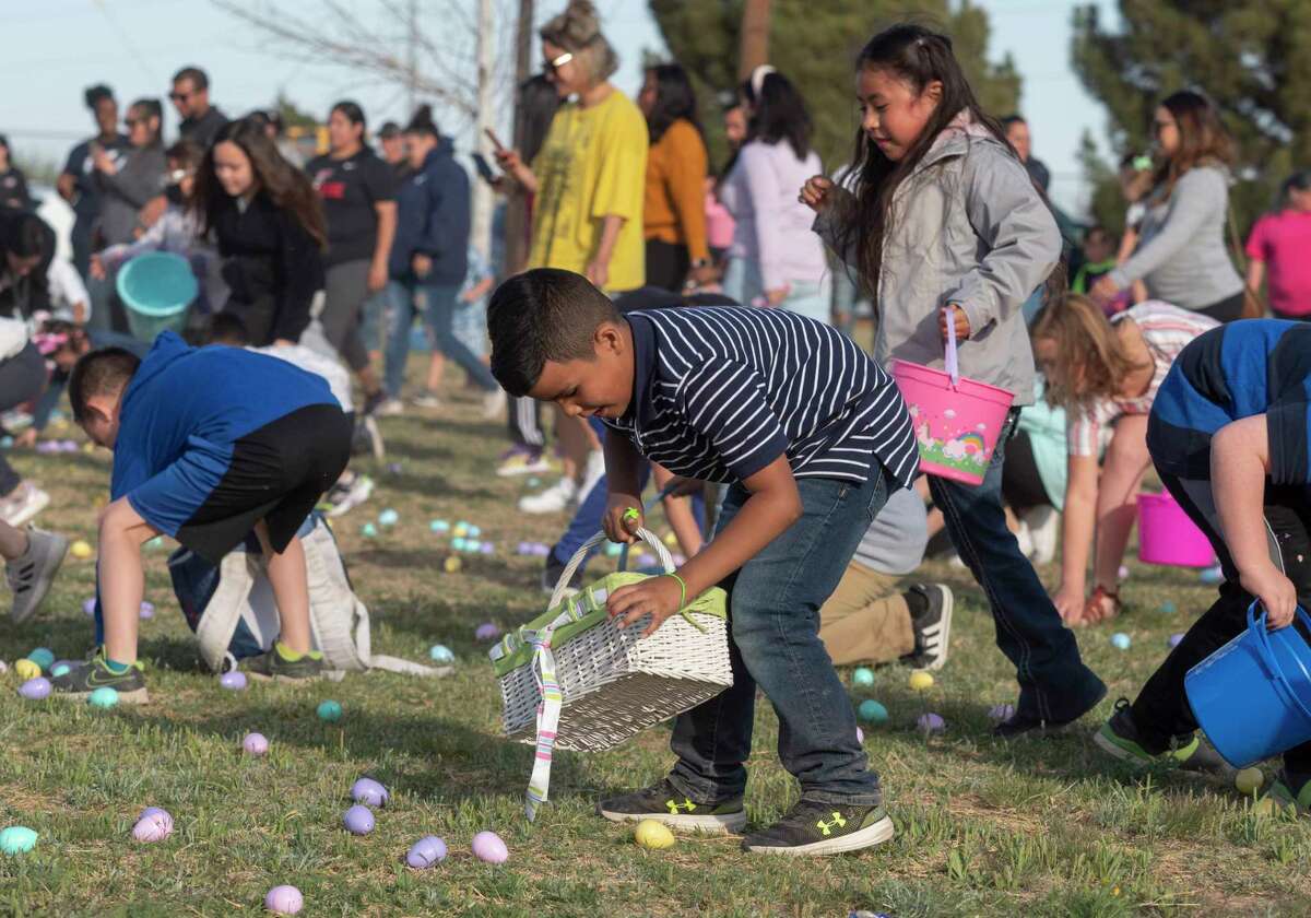 Children make a mad dash for Easter eggs 04/01/21 at the MLK Park during the Easter Eggstravaganza. Tim Fischer/Reporter-Telegram