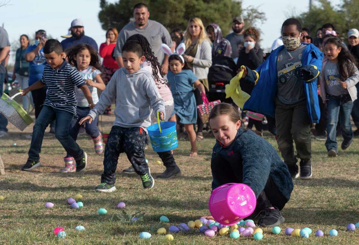 Children make a mad dash for Easter eggs in 2021 at the MLK Park during the Easter Eggstravaganza.  Reporter-Telegram file photo