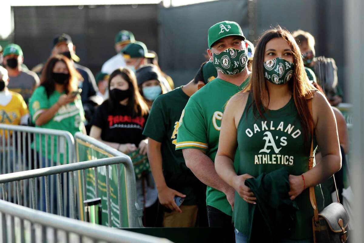 PHOTOS: Fans return to Oakland Coliseum to cheer on A's