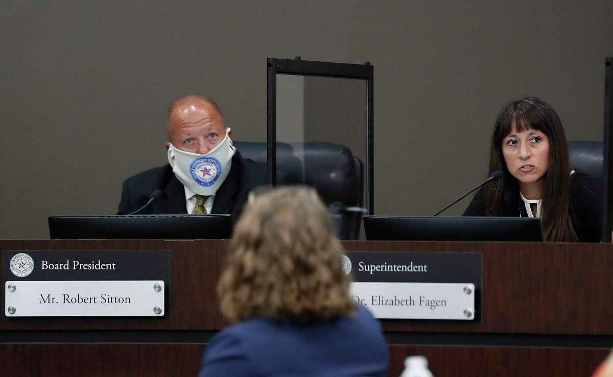 Humble ISD Superintendent Dr. Elizabeth Fagen speaks while Robert Sitton, board president listens during the Humble ISD board meeting to discuss the reopening of schools, Monday, August 3, 2020, in Humble.