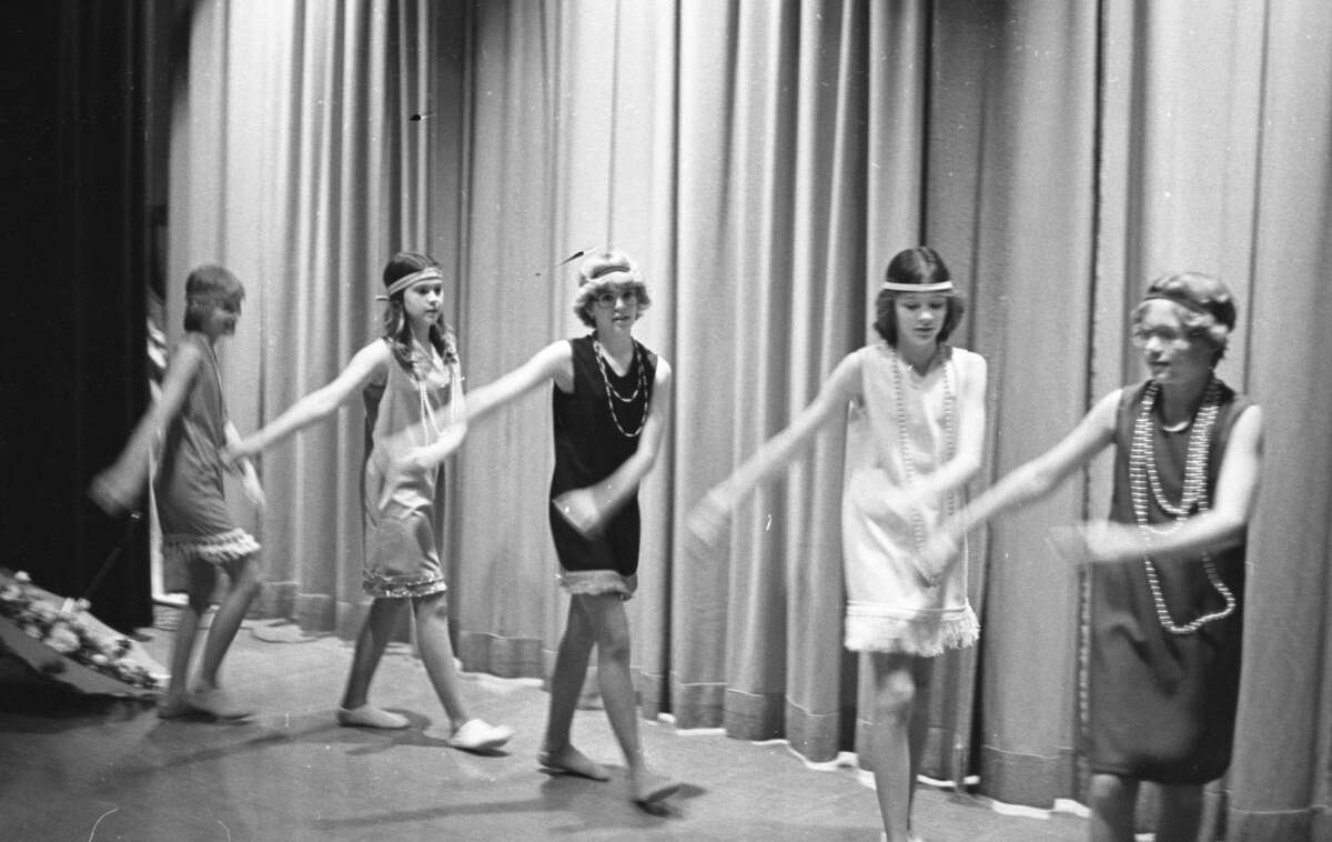 The Super Sewers 4-H Club perform a Charleston dance for a talent show put on Saturday at Kennedy Elementary during the annul 4-H Spring Achievement Day. Those performing are: Tiffany Peterson, Tracy Christenson, Becky Wright, Shelly Swanson and Shelli Kubiak, all of Madison Elementary School. The photo was published in the News Advocate in early April of 1981.