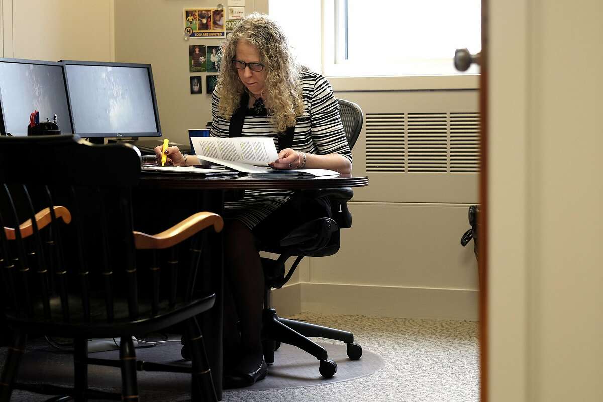 HARRISBURG, PA,- MAY 17: Rachel Levine, MD, physician general for the state of Pennsylvania, works at her desk in Harrisburg, PA, on May 17, 2016. Levine is transgender. (Photo by Bonnie Jo Mount/The Washington Post via Getty Images)