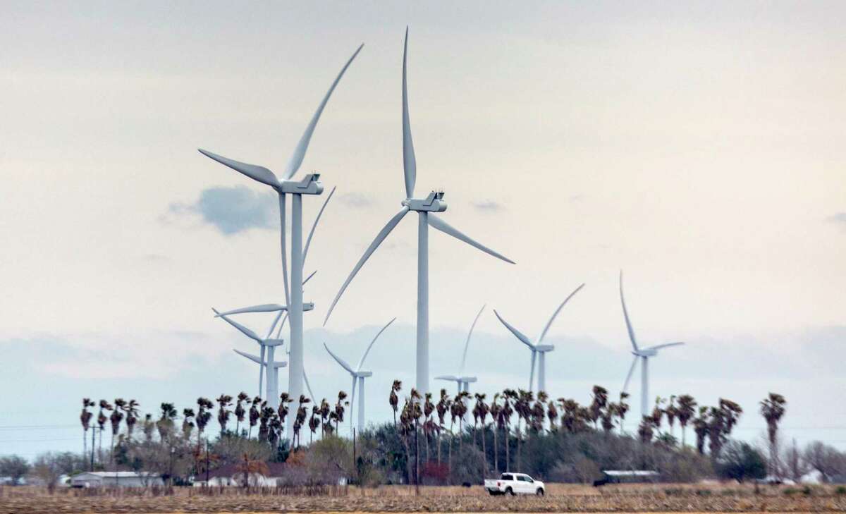 Wind turbines spin in March near Raymondville in the Rio Grande Valley in far South Texas.