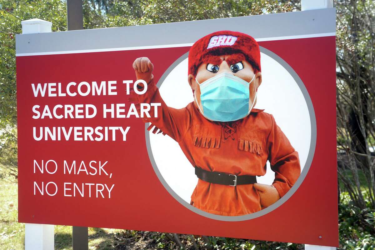A sign at the entrance to Sacred Heart University's west campus, in Fairfield, Conn. March 10, 2021.