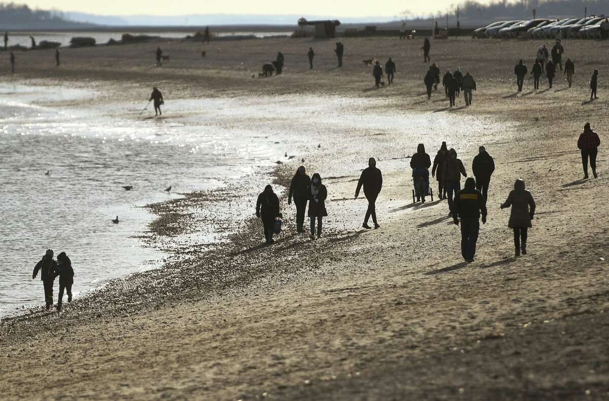 Compo Beach is a popular walking spot during holiday vacation week in Westport, Conn. on Sunday, December 27, 2020.
