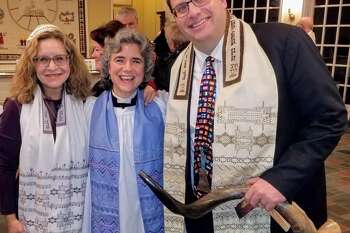 Congregation Shir Shalom of Westchester and Fairfield Counties (46 Peaceable St., Ridgefield) will host its annual Yom HaShoah Holocaust Memorial Observance online with congregations from the Federation for Jewish Philanthropy of Upper Fairfield County, beginning April 7, at 7:30 p.m. On April 8, at 7 p.m., Shir Shalom will join with St. Stephen's Episcopal Church (351 Main St., Ridgefield) in a community interfaith ceremony for Yom HaShoah. The Rev. Whitney Altopp, center, of St. Stephen's Episcopal Church is flanked by Cantor Deborah Katchko-Gray, left, and Rabbi David Reiner, right, of Congregation Shir Shalom. The three form the leadership of the Ridgefield Clergy Association.