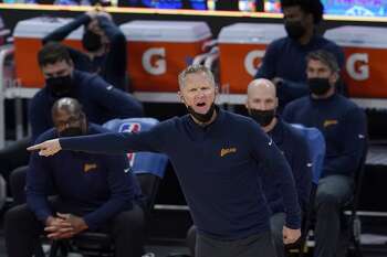 Golden State Warriors coach Steve Kerr gestures during the second half of the team's NBA basketball game against the Philadelphia 76ers in San Francisco, Tuesday, March 23, 2021. (AP Photo/Jeff Chiu)