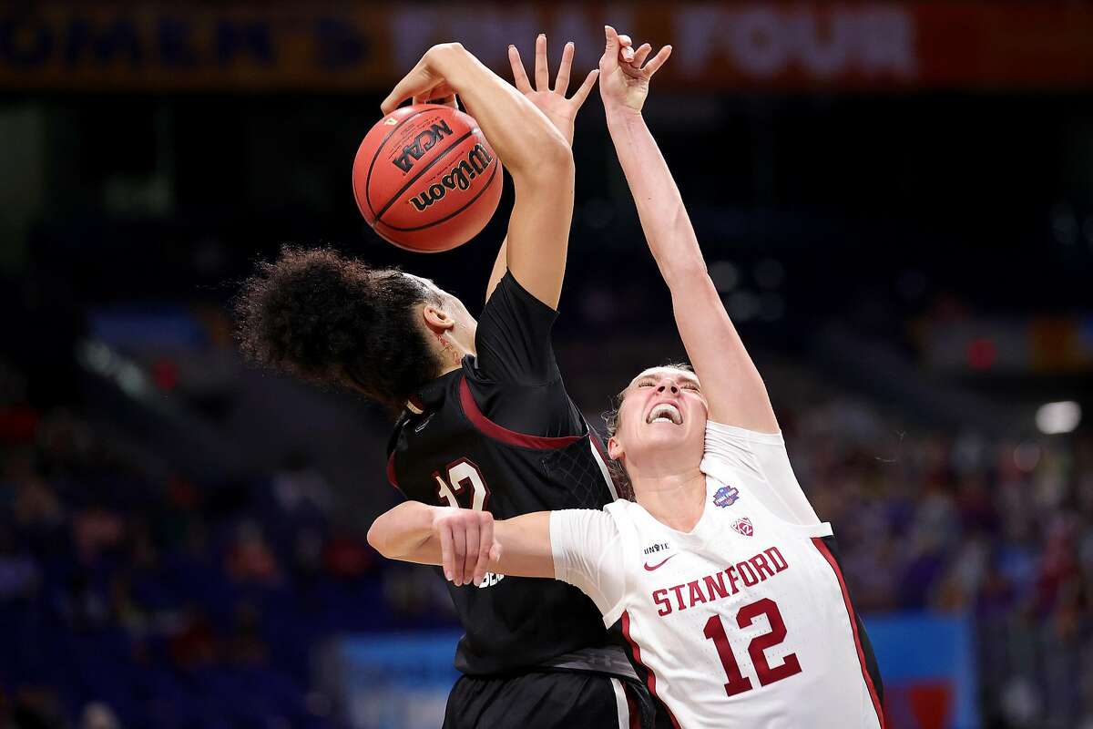 SAN ANTONIO, TEXAS - APRIL 02: Brea Beal #12 of the South Carolina Gamecocks steals the ball from Lexie Hull #12 of the Stanford Cardinal during the second quarter in the Final Four semifinal game of the 2021 NCAA Women's Basketball Tournament at the Alamodome on April 02, 2021 in San Antonio, Texas. (Photo by Carmen Mandato/Getty Images)