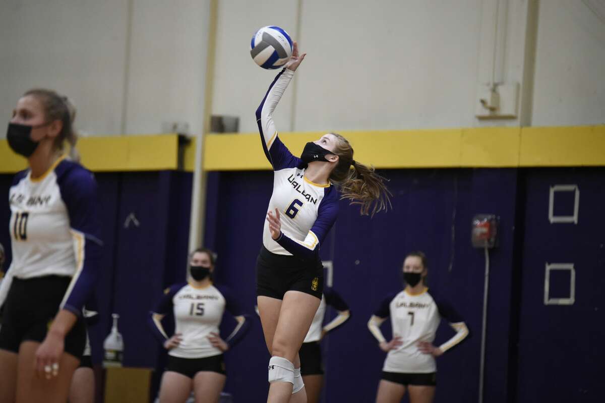 Malea Stanton serves during the America East championship match, which the Danes dropped in five games. (Kathleen Helman / UAlbany Athletics)