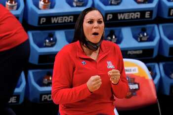 Arizona head coach Adia Barnes reacts during the first half of a women's Final Four NCAA college basketball tournament semifinal game against Connecticut Friday, April 2, 2021, at the Alamodome in San Antonio. (AP Photo/Eric Gay)