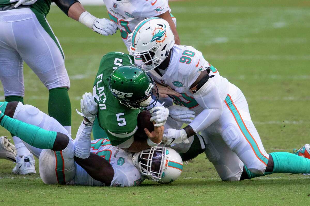 Shaq Lawson (90) sacks Jets quarterback Joe Flacco last season. Lawson is ready to play in the Texans' new 4-3 scheme after being traded to Houston.