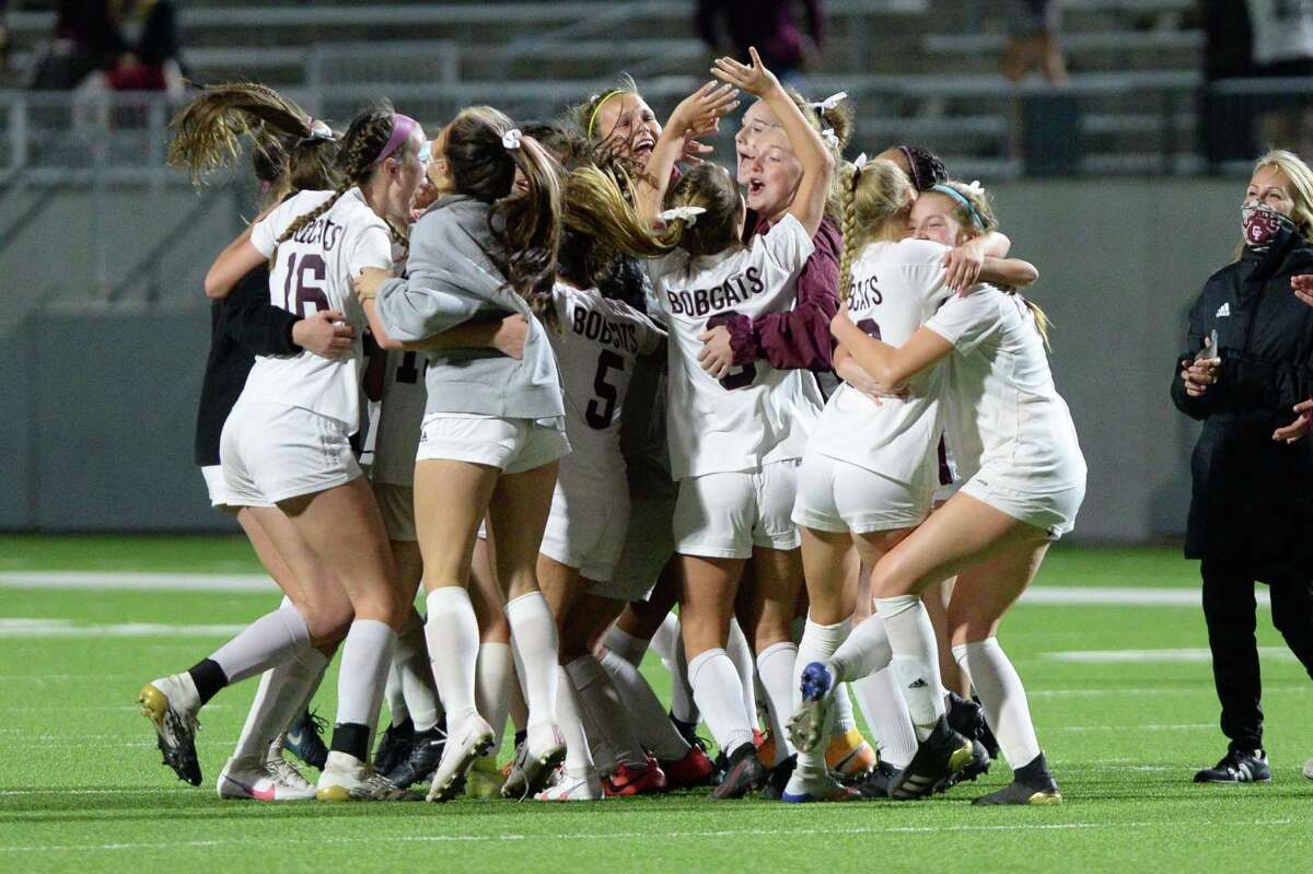The Cy-Fair Bobcats celebrate after their 1-0 victory over the Seven Lakes Spartans in a 6A-III regional quarterfinal soccer match on Friday, April 2, 2021 at Rhodes Stadium, Katy, TX.