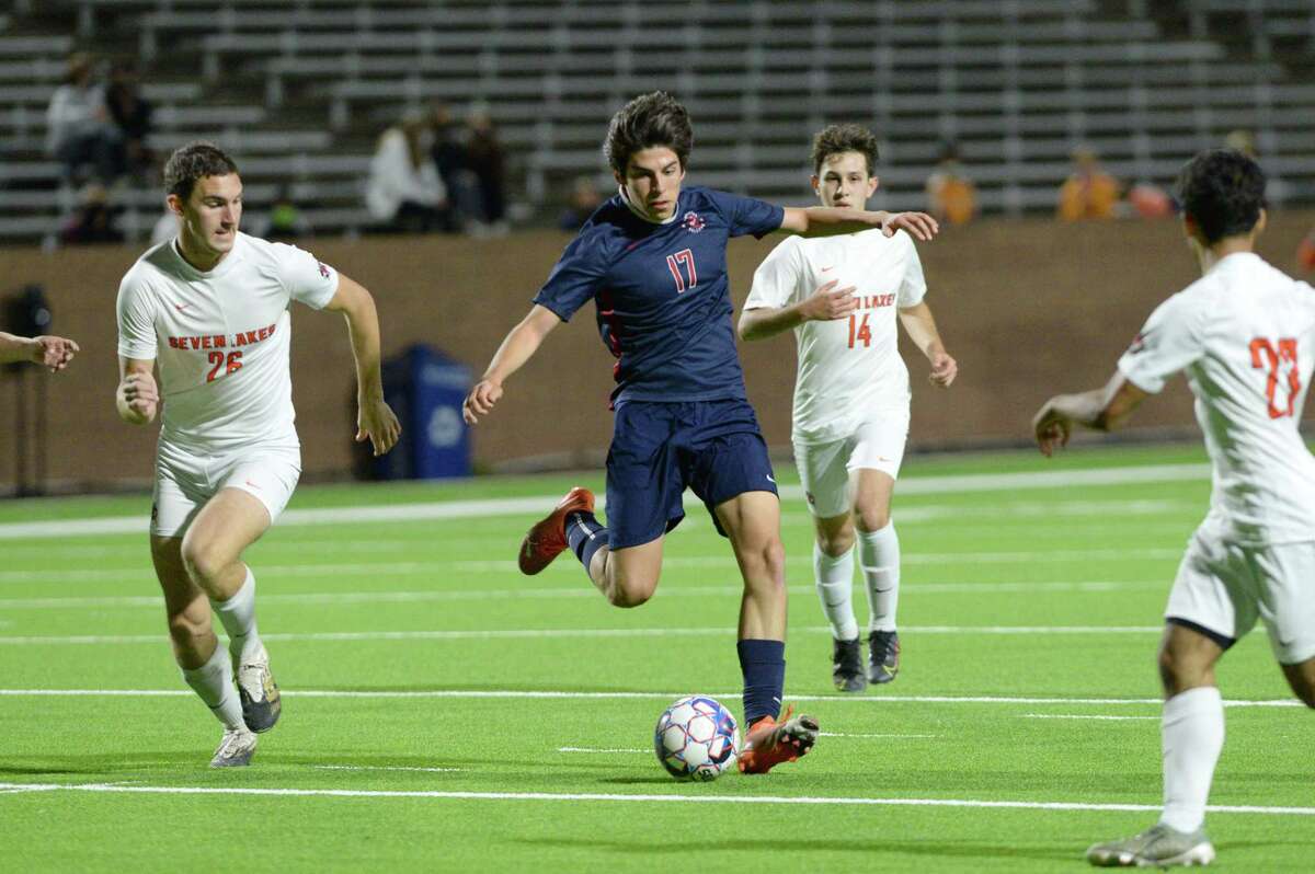 Sam Garcia (17) of Tompkins passes a ball during the first half of a 6A-III regional quarterfinal soccer match between the Seven Lakes Spartans and the Tompkins Falcons on Friday, April 2, 2021 at Legacy Stadium, Katy, TX.