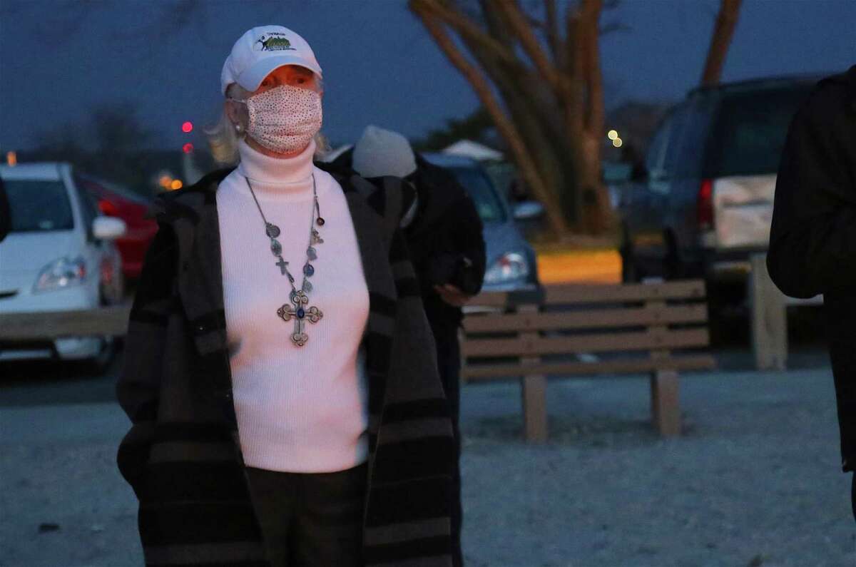 Joan Cavanaugh, of Westport, takes part in the Easter Sunday Sunrise Service at Compo Beach on April 4, 2021.