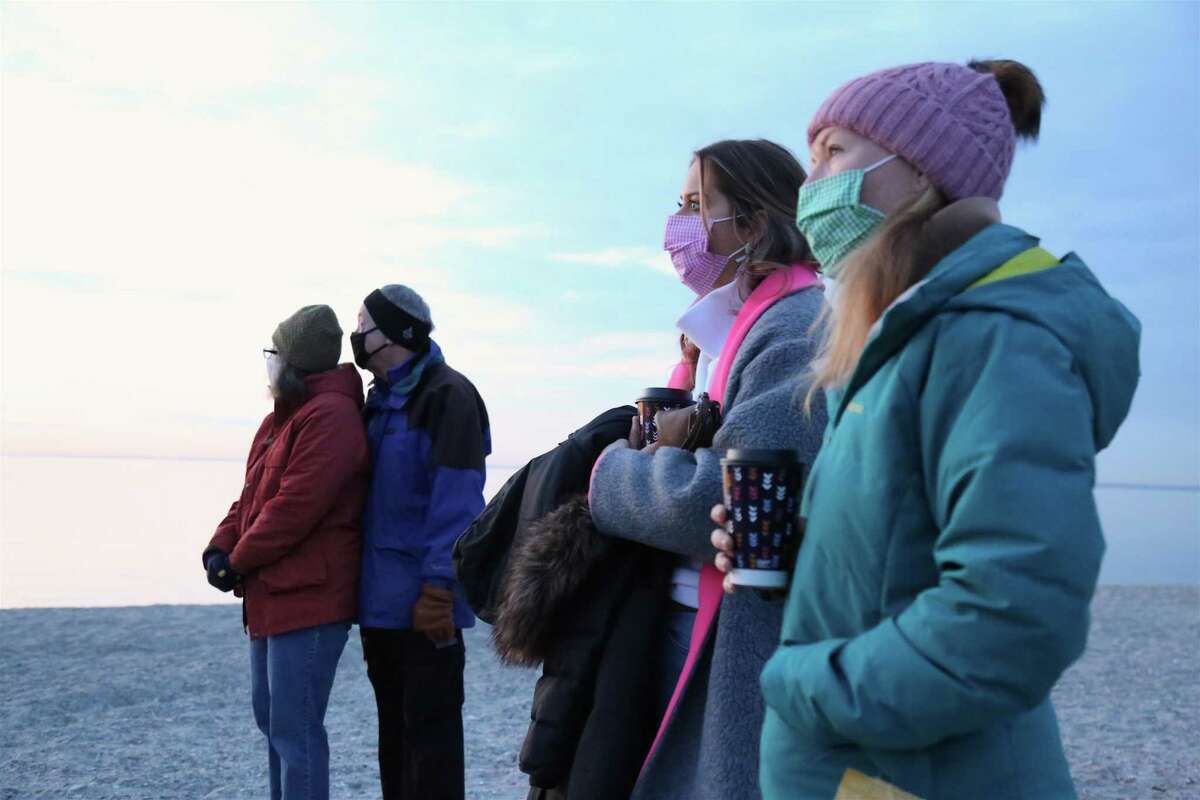 Congregants take part in the Easter Sunday Sunrise Service at Compo Beach on April 4, 2021.