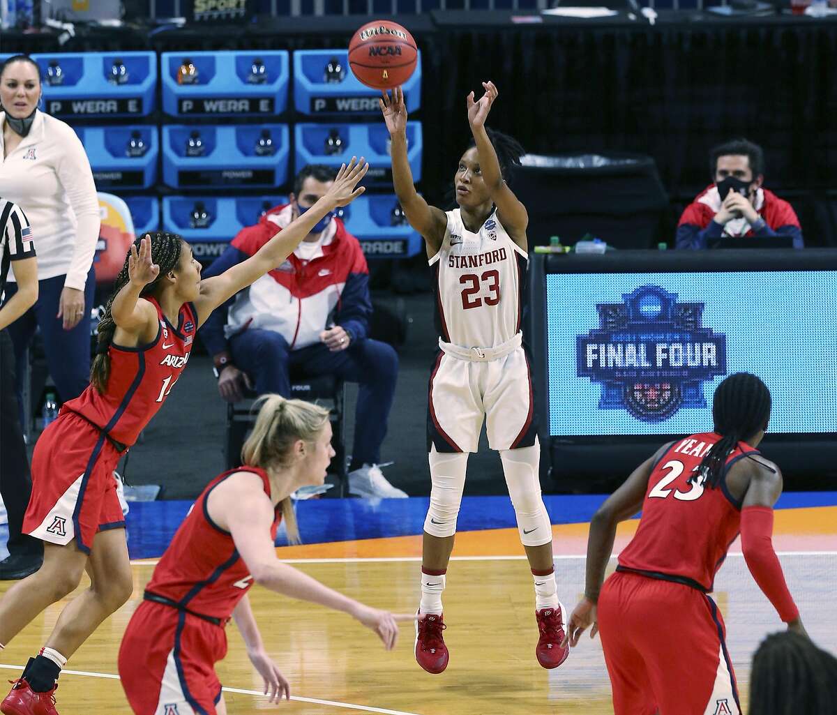 Stanford's Kiana Williams (23) launches a three against Arizona's Sam Thomas (14) during their 2021 NCAA Women's Final Four National Champion basketball game at the Alamodome on Sunday, Apr. 4, 2021.