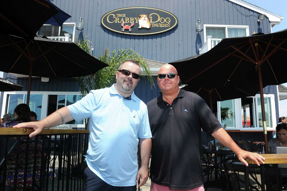 Niall O'Neill and Chris Delmonico of of the former Crabby Dog Tavern, in Stratford, were ordered by a judge to stop retaliating against employees.