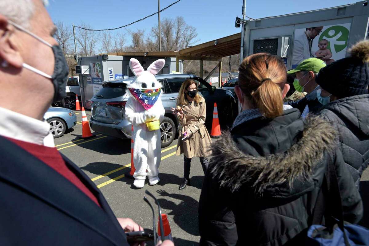 Lt. Governor Susan Bysiewicz shows off a White House Easter egg she received from the Easter Bunny after getting her second dose of COVID_19 vaccine at the Community Health Center's mass vaccination clinic at the Danbury Fair mall. Monday, April 5, 2021, in Danbury, Conn.