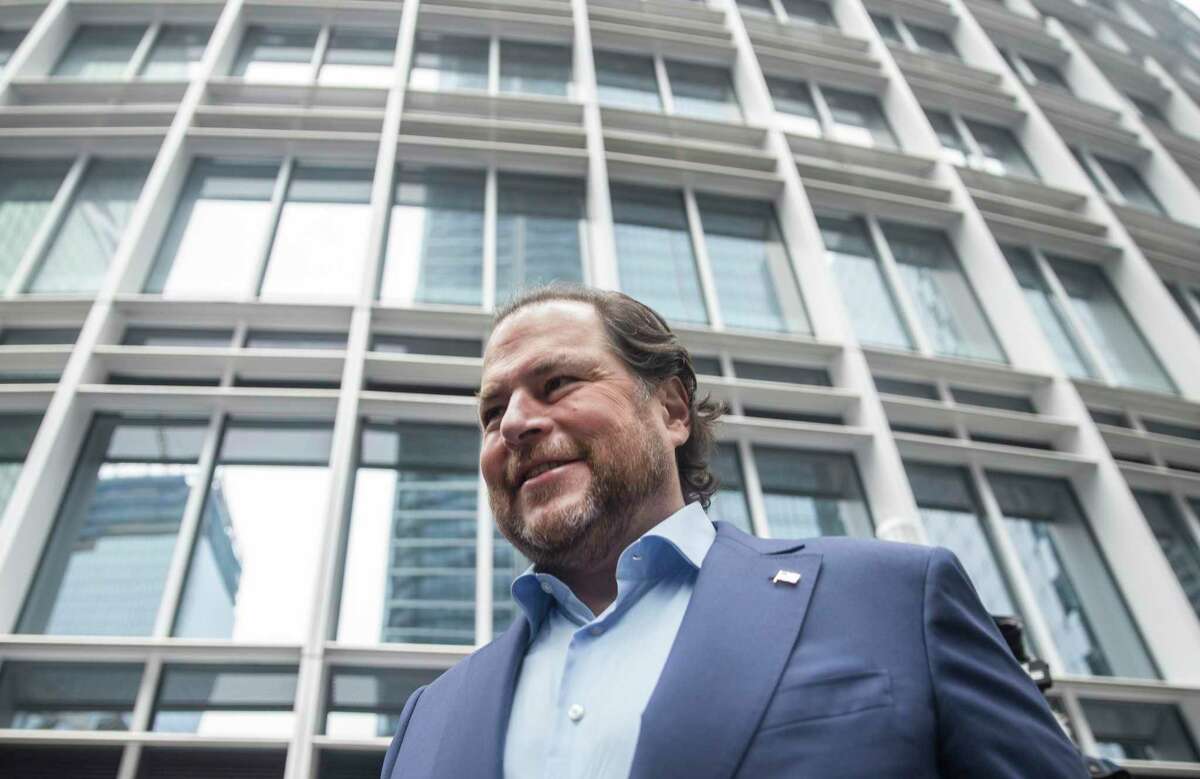 Salesforce CEO Marc Benioff, pictured with Salesforce tower behind him, has called for gun control measures, following the school shooting in Uvalde, Texas.