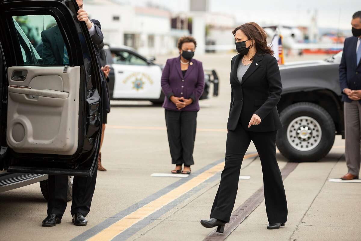 Vice President Kamala Harris enters an SUV after arriving on Air Force 2 to Oakland International Airport's Executive Terminal ahead of a day of scheduled events with local officials in Oakland, Calif. Monday, April 5, 2021.