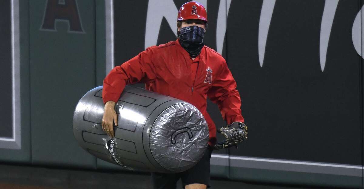 Angels news: Fans protest Astros, throw trash cans on field in