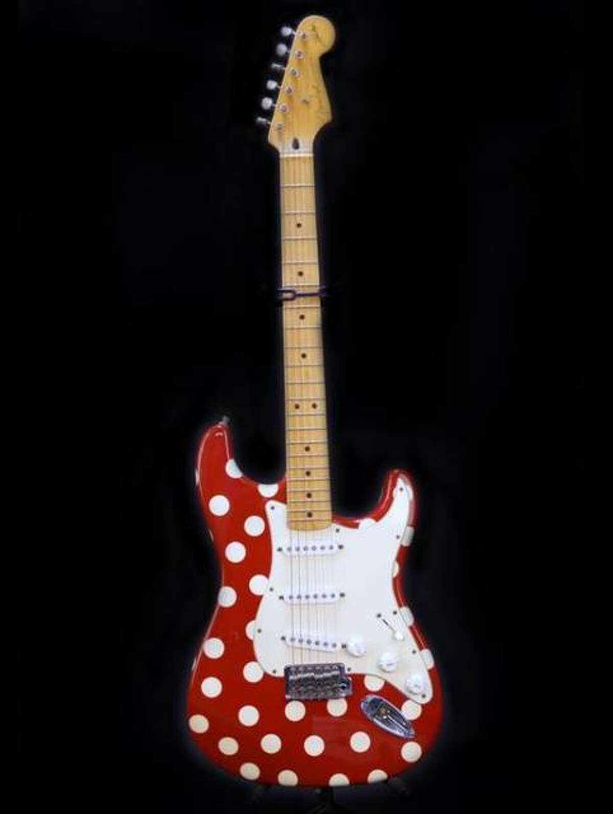 Blues legend Buddy Guy honors his late mother with the polka dot motif on this Feder Stratocaster that has become his trademark for instruments and clothing. The Fender company now makes a Buddy Guy signature guitar for musicians looking to emulate Guy’s ringing tone.
