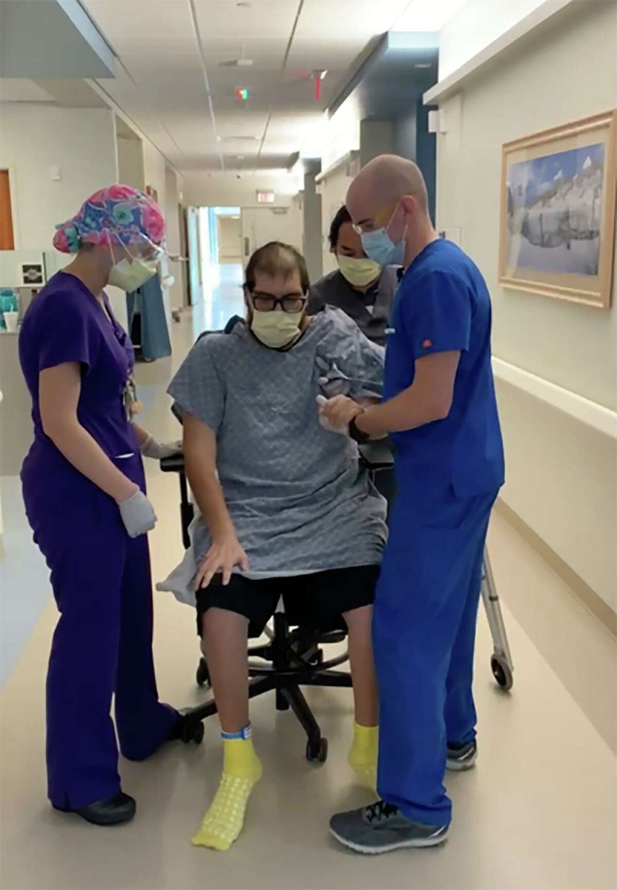 After receiving a double lung transplant after his illness with COVID-19, John Vargas Jr. participates in physical therapy at University of Florida Health Shands Hospital on Oct. 7, 2020.