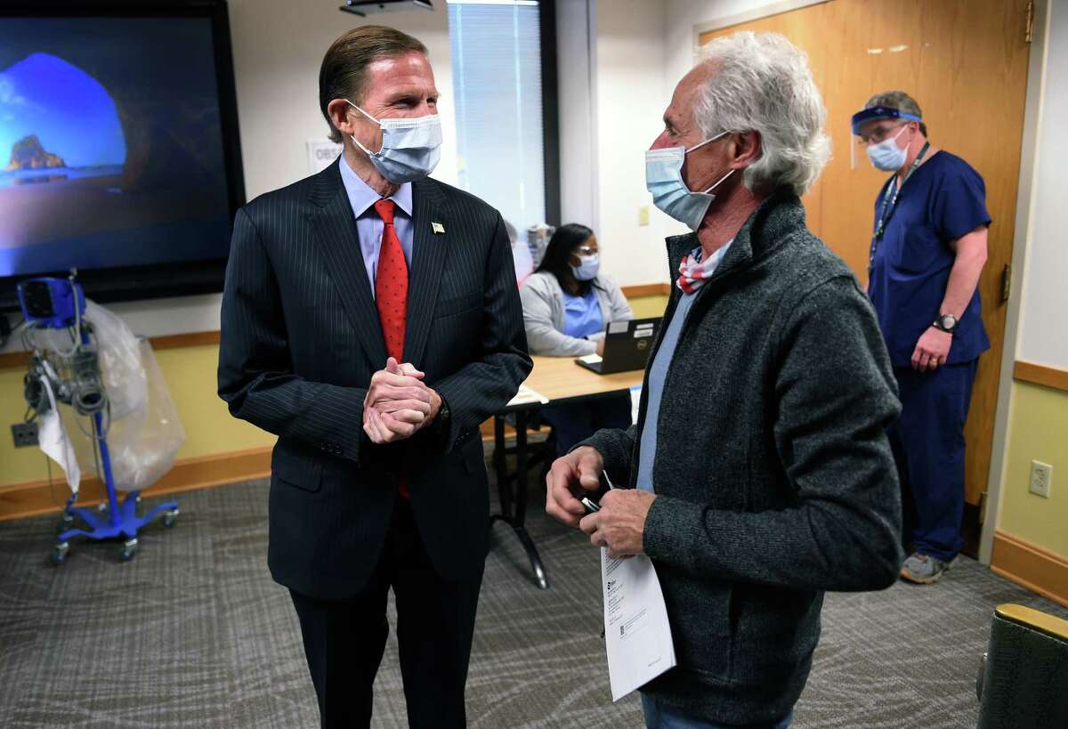 U.S. Senator Richard Blumenthal (left) speaks with Tony Fiorenzi of Waterbury after Fiorenzi and his wife, Sophia, received Pfizer COVID-19 vaccinations at the West Haven VA Medical Center on April 6, 2021. Blumenthal spoke at a press conference about the SAVE LIVES Act, Strengthening and Amplifying Vaccination Efforts to Locally Immunize all Veterans and Every Spouse which provides COVID-19 vaccinations for veterans along with their spouses and caregivers.