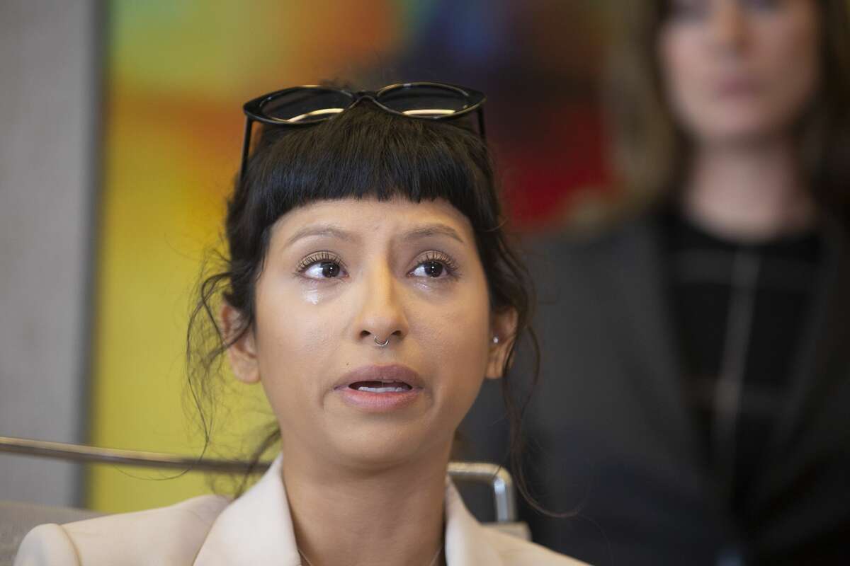 Ashley Solis, the first alleged victim of the sexual assault allegations against Houston Texans quarterback Deshaun Watson, gives a statement during a news conference Tuesday, April 6, 2021, in Houston.