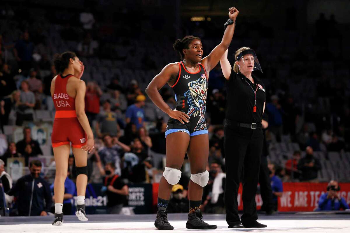 Tamyra Mensah-Stock celebrates her spot on the U.S. Olympic team after beating Kennedy Blades in the team trials in Fort Worth in April.