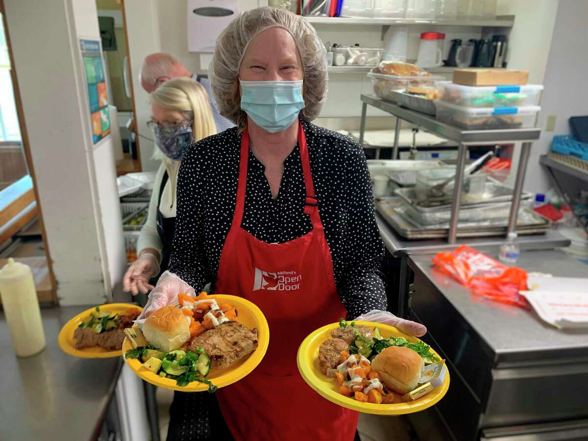 Many volunteers, like Lisa Williams, helped during the Open Door Easter dinner. (Photo Provided)